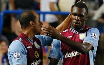 epa03832846 Christian Benteke of Aston Villa (R) celebrates with Gabriel Agbonlahor after scoring a goal during the English Premier League soccer match between Chelsea and Aston Villa at Stamford Bridge, London, Britain, 21 August 2013.  EPA/TAL COHEN DataCo terms and conditions apply https://www.epa.eu/downloads/DataCo-TCs.pdf