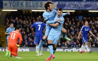 epa04597852 Manchester City's David Silva (L) celebrates with teammate Sergio Aguero (R) after scoring against Chelsea during  English Premier League soccer match Chelsea v Man City at Stamford Bridge in London, Britain, 31 January 2015.  EPA/ANDY RAIN DataCo terms and conditions apply. http://www.epa.eu/files/Terms%20and%20Conditions/DataCo_Terms_and_Conditions.pdf