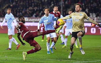 Torino's Nicola Nkoulou and Spal's goalkeeper Etrit Berisha(R) in action during  the Italian Serie A soccer match Torino FC vs S.P.A.L.at the Olimpico Grande Torino stadium in Turin, Italy, 21 December 2019 ANSA/ ALESSANDRO DI MARCO