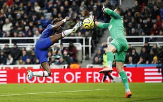 epaselect epa08139514 Newcastle United's Martin Dubravka makes a save from Chelsea's Tammy Abraham during the English Premier league soccer match between Newcastle United and Chelsea held at St James' Park stadium in Newcastle, Britain, 18 January 2020.  EPA/LYNNE CAMERON EDITORIAL USE ONLY.  No use with unauthorized audio, video, data, fixture lists, club/league logos or 'live' services. Online in-match use limited to 120 images, no video emulation. No use in betting, games or single club/league/player publications.