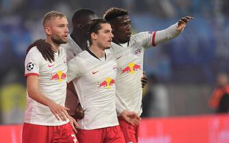 epa07943855 Leipzig's Marcel Sabitzer (C) celebrates scoring the second goal with his team during the UEFA Champions League match between RB Leipzig vs Zenit St.Petersburg in Leipzig, Germany 23 October 2019.  EPA/FILIP SINGER