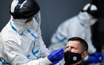 A Kosovar football referee gets tested for COVID-19 at the Fadil Vokrri Stadium in Pristina on May 30, 2020. - Since March 14, all sporting events have been postponed in Kosovo, due to the risk of the Coronavirus pandemic. (Photo by Armend NIMANI / AFP) (Photo by ARMEND NIMANI/AFP via Getty Images)