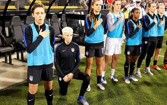 COLUMBUS, OH - SEPTEMBER 15:  Megan Rapinoe #15 of the U.S. Women's National Team kneels during the playing of the U.S. National Anthem before a match against Thailand on September 15, 2016 at MAPFRE Stadium in Columbus, Ohio.  (Photo by Jamie Sabau/Getty Images)