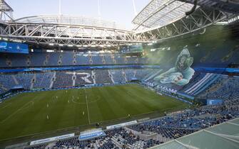 epa08511057 View of semi-empty Gazprom arena during the Russian Premier League soccer match between Zenit St. Petersburg and  Krylia Sovetov Samara in St. Petersburg, Russia, 26 June 2020. Russian Soccer Premier League restarts matches after a lockdown caused by coronavirus pandemic with limited quantity of fans.  EPA/ANATOLY MALTSEV