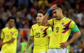 epa06862269 Radamel Falcao (R) of Colombia reacts during the FIFA World Cup 2018 round of 16 soccer match between Colombia and England in Moscow, Russia, 03 July 2018.

(RESTRICTIONS APPLY: Editorial Use Only, not used in association with any commercial entity - Images must not be used in any form of alert service or push service of any kind including via mobile alert services, downloads to mobile devices or MMS messaging - Images must appear as still images and must not emulate match action video footage - No alteration is made to, and no text or image is superimposed over, any published image which: (a) intentionally obscures or removes a sponsor identification image; or (b) adds or overlays the commercial identification of any third party which is not officially associated with the FIFA World Cup)  EPA/PETER POWELL   EDITORIAL USE ONLY