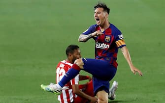 epa08519052 FC Barcelona's Lionel Messi reacts during the Spanish LaLiga soccer match between FC Barcelona and Atletico Madrid at Camp Nou stadium, Barcelona, Spain, 30 June 2020.  EPA/ALBERTO ESTEVEZ