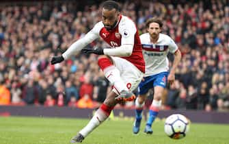 epa06640564 Arsenal's Alexandre Lacazette scores a penalty during the English Premier League soccer match between Arsenal FC and Stoke City at the Emirates stadium in north London, Britain, 01 April 2018.  EPA/SEAN DEMPSEY EDITORIAL USE ONLY. No use with unauthorized audio, video, data, fixture lists, club/league logos or 'live' services. Online in-match use limited to 75 images, no video emulation. No use in betting, games or single club/league/player publications.