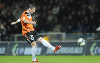 FOOTBALL - FRENCH CHAMPIONSHIP 2009/2010 - L1 - FC LORIENT v OLYMPIQUE LYONNAIS - 20/01/2010 - PHOTO PASCAL ALLEE / DPPI - OLIVIER MONTERRUBIO (LOR)  