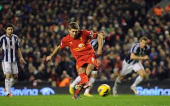 epa03579727 Liverpool's Steven Gerrard ( C ) shoots from the penalty spot but fails to score during the English Premier League soccer match against West Bromwich Albion at Anfield stadium, Liverpool, Britain, 11 February 2013.  EPA/PETER POWELL DataCo terms and conditions apply.  http://www.epa.eu/downloads/DataCo-TCs.pdf