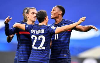 epa08655374 France's Antoine Griezmann (L), Wissam Ben Yedder (C) and Anthony Martial (R) celebrate  during the UEFA Nations League soccer match between France and Croatia at the Stade de France, Saint Denis, France, 08 September 2020.  EPA/PASCAL BONNIERE FRANCE OUT / SHUTTERSTOCK OUT