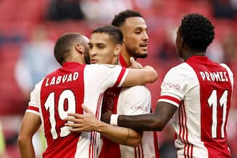 epa08684263 (L-R) Zakaria Labyad of Ajax, Antony Matheus Dos Santos of Ajax, Noussair Mazraoui or Ajax, Quincy Promes or Ajax celebrate the 2-0 goal during the Dutch Eredivisie soccer match between Ajax Amsterdam and RKC Waalwijk at the Johan Cruijff Arena in Amsterdam, The Netherlands, 20 September 2020.  EPA/MAURICE VAN STEEN