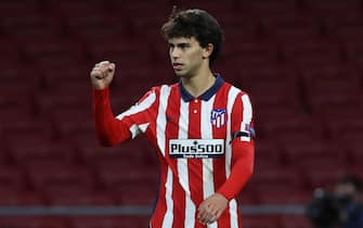 epa08855799 Atletico Madrid's Joao Felix (L) celebrates after scoring the 1-0 lead during the UEFA Champions League group A soccer match between Atletico Madrid and Bayern Munich in Madrid, Spain, 01 December 2020.  EPA/Juanjo Martin