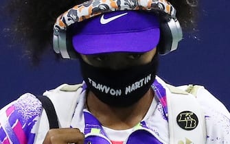 NEW YORK, NEW YORK - SEPTEMBER 06: Naomi Osaka of Japan walks out wearing a mask with the name of Trayvon Martin printed on it before her Womenâ  s Singles fourth round match against Anett Kontaveit of Estonia on Day Seven of the 2020 US Open at the USTA Billie Jean King National Tennis Center on September 6, 2020 in the Queens borough of New York City. (Photo by Matthew Stockman/Getty Images)