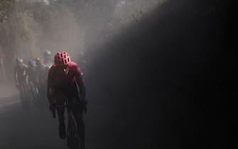 TOPSHOT - Team EF Pro Cycling Italian rider Alberto Bettiol pedal during a break away through a dusty gravel road in the one-day classic cycling race Strade Bianche (White Roads) on August 1, 2020 around Siena, Tuscany. (Photo by Marco Bertorello / AFP) (Photo by MARCO BERTORELLO/AFP via Getty Images)
