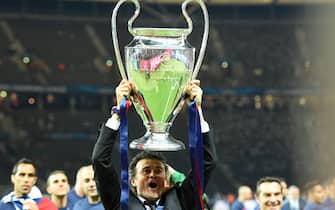FC Barcelona's head coach Luis Enrique celebrates with the trophy after the UEFA Champions League final soccer match between Juventus FC and FC Barcelona at Olympiastadion in Berlin, Germany, 06 June 2015. Photo: Marcus Brandt/dpa