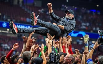 File photo dated 01-06-2019 of Liverpool manager Jurgen Klopp is throw into the air by his players after winning the UEFA Champions League Final at the Wanda Metropolitano, Madrid.