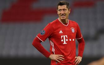 epa08763707 Robert Lewandowski of FC Bayern Munich reacts during the UEFA Champions League Group A stage match between FC Bayern Munich and Atletico Madrid at Allianz Arena in Munich, Germany, 21 October 2020.  EPA/Alexander Hassenstein / POOL