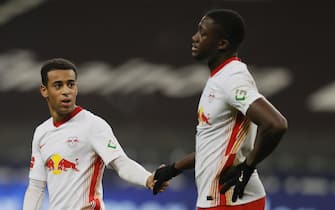 epa08834590 Leipzig players Tyler Adams (L) and Ibrahima Konate (R) react after the German Bundesliga soccer match between SG Eintracht Frankfurt and RB Leipzig in Frankfurt, Germany, 21 November 2020.  EPA/RONNY WITTEK / POOL CONDITIONS - ATTENTION: The DFL regulations prohibit any use of photographs as image sequences and/or quasi-video.
