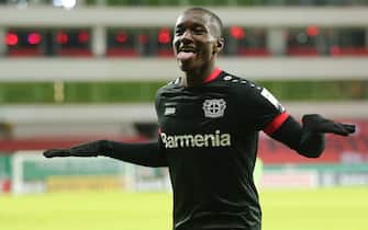 epa08933770 Moussa Diaby of Bayer Leverkusen celebrates after scoring their team's third goal during the DFB Cup second round match between Bayer 04 Leverkusen and Eintracht Frankfurt at BayArena in Leverkusen, Germany, 12 January 2021.  EPA/CHRISTOF KOEPSEL / POOL The DFB regulations prohibit any use of photographs as image sequences and/or quasi-video.