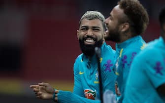 epa09246485 A handout photo made available by the Brazilian Football Confederation (CBF) shows players Gabriel Barbosa (L) and Neymar Jr (R) as they converser during a traiing session for the Brazilian national soccer team at the Beira-Rio stadium, in Porto Alegre, Brazil, 03 June 2021. The Brazilian team faces Ecuador on Friday for the South American qualifiers for the Qatar 2022 World Cup.  EPA/Lucas Figueiredo / HANDOUT  HANDOUT EDITORIAL USE ONLY/NO SALES