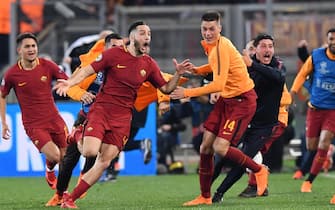 Roma's Kostas Manolas (C) jubilates with his teammates after scoring the goal during the UEFA Champions League quarter final second leg match AS Roma vs FC Barcelona at Olimpico stadium in Rome, Italy, 10 April 2018.
ANSA/ETTORE FERRARI