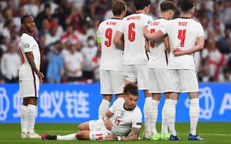 LONDON, ENGLAND - JULY 11: Kalvin Phillips of England lays behind the defensive wall during the UEFA Euro 2020 Championship Final between Italy and England at Wembley Stadium on July 11, 2021 in London, England. (Photo by Claudio Villa/Getty Images)