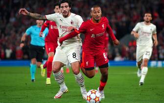 AC Milan's Sandro Tonali (left) and Liverpool's Thiago Alcantara battle for the ball during the UEFA Champions League, Group B match at Anfield, Liverpool. Picture date: Wednesday September 15, 2021.