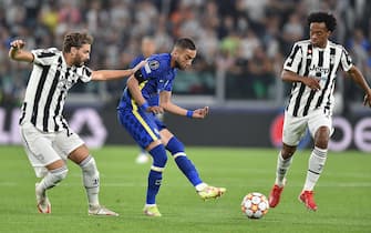 Juventus’ Manuel Locatelli, Juan Cuadrado and Chelsea’s Hakim Ziyech in action during the Uefa Champions League soccer match Juventus FC vs Chelsea FC at Allianz Stadium in Turin, Italy, 29 september 2021 ANSA/ALESSANDRO DI MARCO