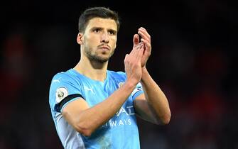 LIVERPOOL, ENGLAND - OCTOBER 03: Ruben Dias of Manchester City applauds the fans following the Premier League match between Liverpool and Manchester City at Anfield on October 03, 2021 in Liverpool, England. (Photo by Michael Regan/Getty Images)
