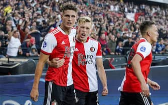 epa09377545 Guus Til (L) of Feyenoord celebrates with teammates after scoring the 2-2 equalizer during the UEFA Conference League second qualifying round, second leg soccer match between Feyenoord and FC Drita in Rotterdam, Netherlands, 29 July 2021.  EPA/Tom Bode