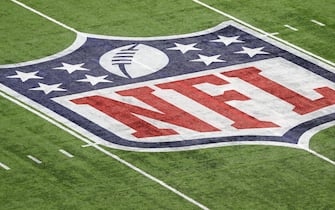 epa05773463 A photographer shoots the NFL logo on the field several hours before the start of Super Bowl LI at NRG Stadium in Houston, Texas, USA, 05 February 2017. The AFC Champion Patriots play the NFC Champion Atlanta Falcons in the National Football League's annual championship game.  EPA/ANDREW GOMBERT