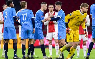 1237865452 AMSTERDAM - Devin Plank of Excelsior Maassluis enters the field during the Toto Knvb Cup match between Ajax Amsterdam and Excelsior Maassluis (am) at the Johan Cruijff ArenA on August 14, 2021 in Amsterdam, Netherlands. ANP OLAF KRAAK (Photo by ANP via Getty Images)
