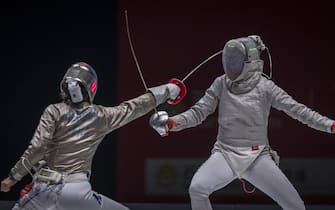 epa06913437 Cecilia Berder (L) from France in action against Sofia Pozdniakova (R) of Russia during the team women's Saber final at the Fencing World Championships in Wuxi, China, 27 July 2018.  EPA/ALEKSANDAR PLAVEVSKI