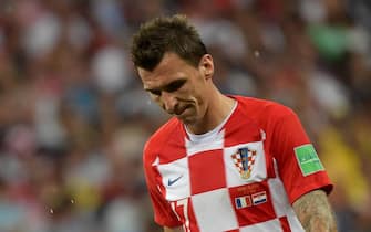 epa06890618 Mario Mandzukic of Croatia reacts during the FIFA World Cup 2018 final between France and Croatia in Moscow, Russia, 15 July 2018.

(RESTRICTIONS APPLY: Editorial Use Only, not used in association with any commercial entity - Images must not be used in any form of alert service or push service of any kind including via mobile alert services, downloads to mobile devices or MMS messaging - Images must appear as still images and must not emulate match action video footage - No alteration is made to, and no text or image is superimposed over, any published image which: (a) intentionally obscures or removes a sponsor identification image; or (b) adds or overlays the commercial identification of any third party which is not officially associated with the FIFA World Cup)  EPA/PETER POWELL   EDITORIAL USE ONLY