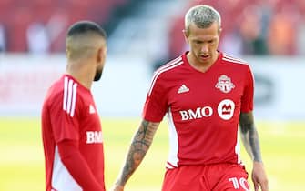 TORONTO, ON - JULY 23:  Federico Bernardeschi #10 and Lorenzo Insigne #24 of Toronto FC warm up prior to making their MLS debuts against Charlotte FC at BMO Field on July 23, 2022 in Toronto, Ontario, Canada.  (Photo by Vaughn Ridley/Getty Images)