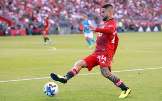 TORONTO, ON - JULY 23:  Lorenzo Insigne #24 of Toronto FC juggles the ball while making his MLS debut against Charlotte FC at BMO Field on July 23, 2022 in Toronto, Ontario, Canada.  (Photo by Vaughn Ridley/Getty Images)