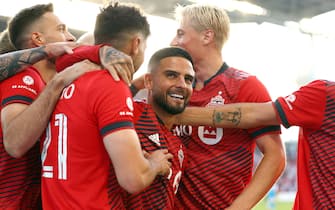 TORONTO, ON - JULY 23:  Jonathan Osorio #21 of Toronto FC celebrates a goal with Lorenzo Insigne (C) #24 and teammates in an MLS game against Charlotte FC at BMO Field on July 23, 2022 in Toronto, Ontario, Canada.  (Photo by Vaughn Ridley/Getty Images)