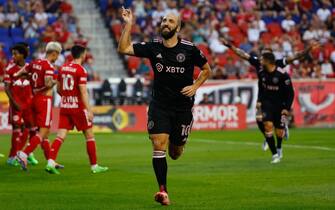 HARRISON, NJ - AUGUST 27:  Inter Miami forward Gonzalo HiguaÃ­n (10) celebrates after scoring on a free kick during the first half of the Major League Soccer game between the New York Red Bulls and Inter Miami on August 27, 2022 at Red Bull Arena in Harrison, New Jersey.   (Photo by Rich Graessle/Icon Sportswire via Getty Images)