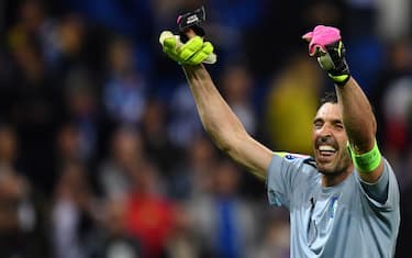 Goalkeeper Gianluigi Buffon of Italy celebrates during the Group E soccer match of the UEFA EURO 2016 between Belgium and Italy at the Stade de Lyon in Lyon, France, 13 June 2016. Photo: Uwe Anspach/dpa (RESTRICTIONS APPLY: For editorial news reporting purposes only. Not used for commercial or marketing purposes without prior written approval of UEFA. Images must appear as still images and must not emulate match action video footage. Photographs published in online publications (whether via the Internet or otherwise) shall have an interval of at least 20 seconds between the posting.)