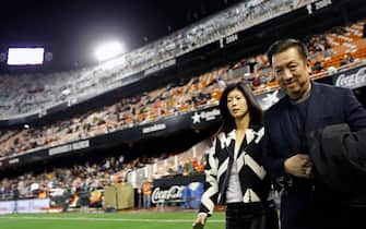 Valencia CF's new owner Peter Lim (R) at his arrival to Mestalla stadium to watch the Primera Division soccer match against FC Barcelona in Valencia, eastern of Spain on 30 November 2014. EFE/Juan Carlos Cardenas