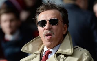 epa06932332 (FILE) - Arsenal's owner Stan Kroenke reacts  during the English Premier League soccer match between Liverpool FC and Arsenal FC at Anfield Road stadium in Liverpool, Britain, 08 February 2014 (reissued 07 August 2018). Reportedly, Arsenal majority owner Kroeke on 07 August 2018 offered a 777 million US dollar to take over full ownership of the English Premier League soccer club. Kroenke is currently in posession of 67 percent through his company KSE.  EPA/PETER POWELL
