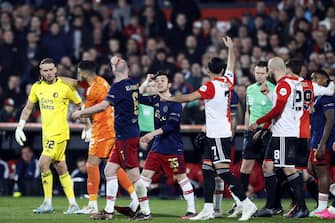 epa10560638 Davy Klaassen of Ajax (3-L) reacts after being hit by an object during the Semifinal of the KNVB Cup match between Feyenoord Rotterdam and AFC Ajax, in Rotterdam, the Netherlands, 05 April 2023.  EPA/KOEN VAN WEEL