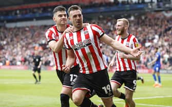 Sheffield United's Jack Robinson (centre) celebrates scoring their side's second goal of the game during the Sky Bet Championship match at Bramall Lane, Sheffield. Picture date: Saturday April 15, 2023.