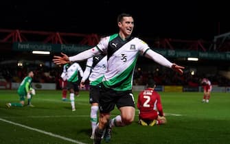 Plymouth Argyle's Conor Grant celebrates scoring their side's second goal of the game during the Sky Bet League One match at the Wham Stadium, Accrington. Picture date: Tuesday March 21, 2023.