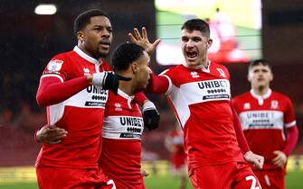 Middlesbrough's Chuba Akpom (left) celebrates scoring their side's fifth goal of the game during the Sky Bet Championship match at the Riverside Stadium, Middlesbrough. Picture date: Friday April 14, 2023.