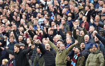 West Ham United supporters in good voice during the Premier League match between West Ham United and Chelsea at the London Stadium, Queen Elizabeth Olympic Park , London, England on 11 February 2023. 

Photo by Phil Hutchinson.
Editorial use only, license required for commercial use. No use in betting, games or a single club/league/player publications.