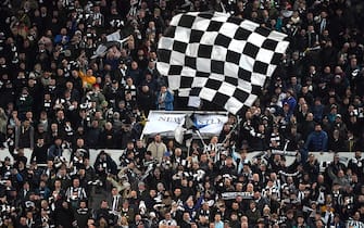 Newcastle United fans wave a large black & white flag during the Carabao Cup Semi Final second leg match at St. James's Park, Newcastle upon Tyne. Picture date: Tuesday January 31, 2023.