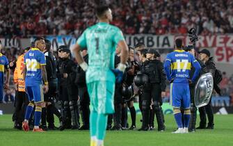 epa10614771 Members of the police intervene at the end of a soccer match between River Plate and Boca Juniors during the First Division Championship played at Monumental stadium in Buenos Aires, Argentina 07 May 2023.  EPA/JUAN IGNACIO RONCORONI