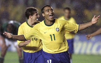 RIO DE JANEIRO, BRAZIL - SEPTEMBER 3:  Brazil's Romario celebrates his third goal in the game against Bolivia 03 September, 2000, during the World Cup 2002 qualification game in Maracana Stadium in Rio de Janeiro. Brazil won 5-0.  (ELECTRONIC IMAGE)  (Photo credit should read VANDERLEI ALMEIDA/AFP/Getty Images)