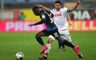 epa08275343 Paderborn's Christopher Antwi-Adjei (L) in action against Cologne's Jonas Hector (R) during the German Bundesliga soccer match between SC Paderborn and FC Cologne in Paderborn, Germany, 06 March 2020.  EPA/FRIEDEMANN VOGEL CONDITIONS - ATTENTION: The DFL regulations prohibit any use of photographs as image sequences and/or quasi-video.